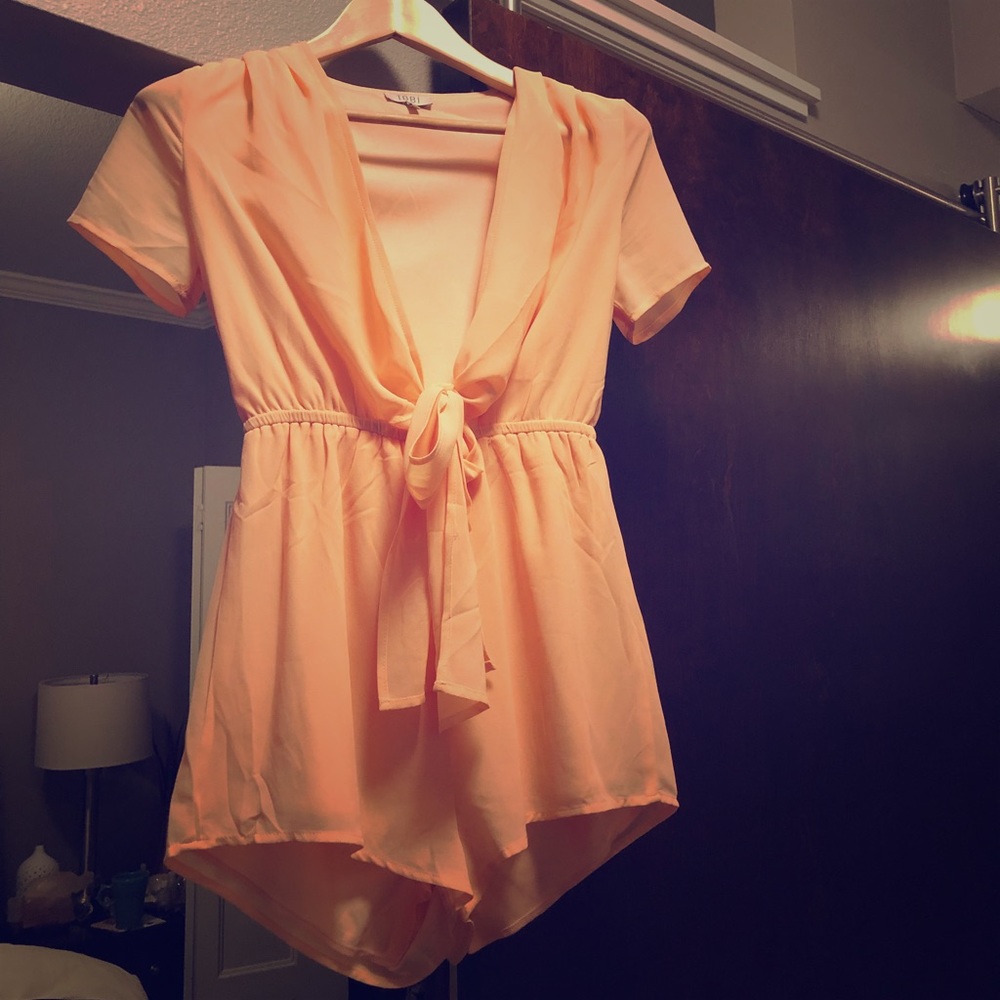 Tobi romper. Only worn once. Size small.